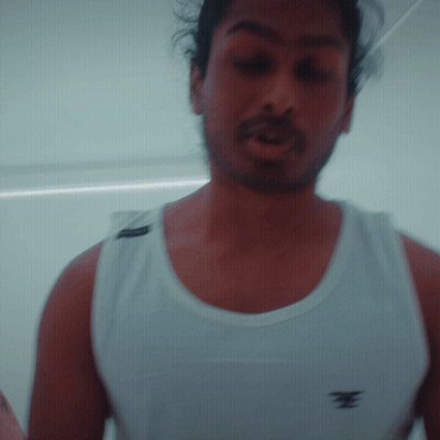Bearded Man In White Tank Top With E GIF