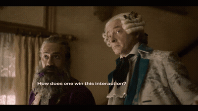 Bearded Man In Wig Asking How Does One Win This Interaction GIF