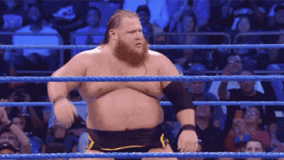 Bearded Man In Wrestling Ring With Crowd GIF