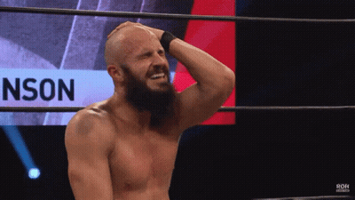 Bearded Man In Wrestling Ring With Nson Behind Him GIF