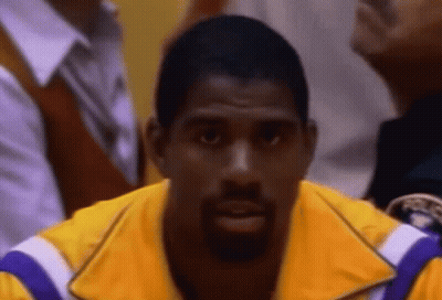 Bearded Man In Yellow Jacket With Purple Stripes GIF