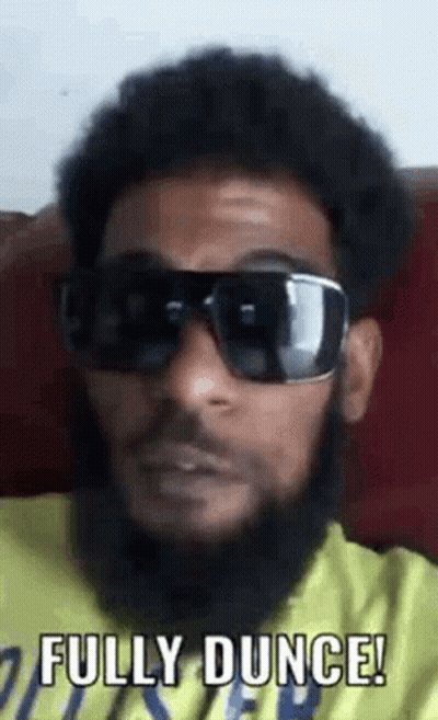 Bearded Man In Yellow Shirt And Sunglasses GIF