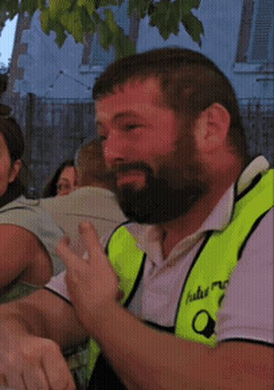 Bearded Man In Yellow Vest Saying Hulu GIF