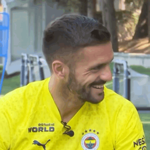 Bearded Man in Yellow World Shirt