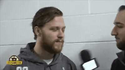 Bearded Man Interviewed By NHL Bruins Broadcaster GIF