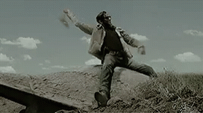 Bearded Man Jumping In Field GIF