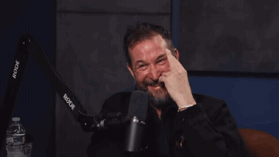 Bearded Man Laughing At Rode Microphone GIF