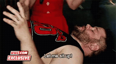 Bearded Man Laying On Ground Let Me Sit Up GIF
