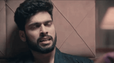 Bearded Man Leaning Against Wall Eyes Closed Mouth Open GIF