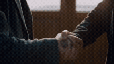 Bearded Man Looking At Another Man GIF