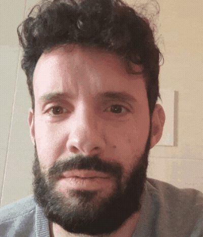 Bearded Man Looking At Camera Seriously GIF