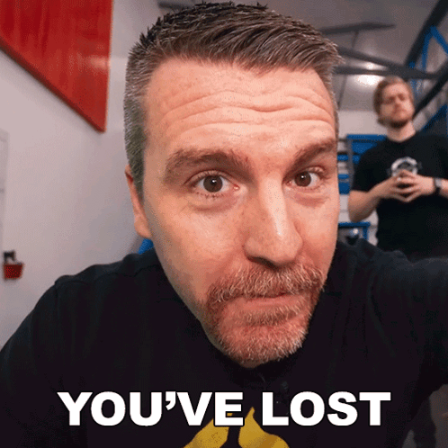 Bearded Man Looking At Camera With You've Lost Below GIF