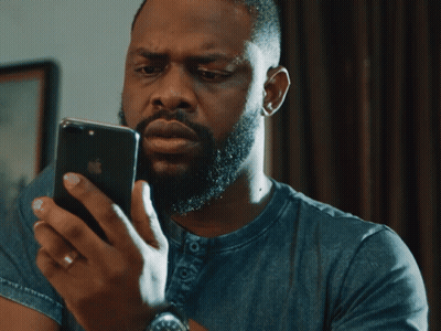 Bearded Man Looking At Phone Eyes Closed GIF