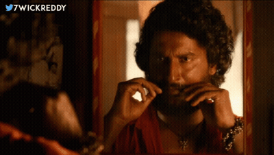 Bearded Man Looking In Mirror With 7Wickreddy GIF