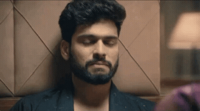 Bearded Man Lying Down Eyes Closed GIF