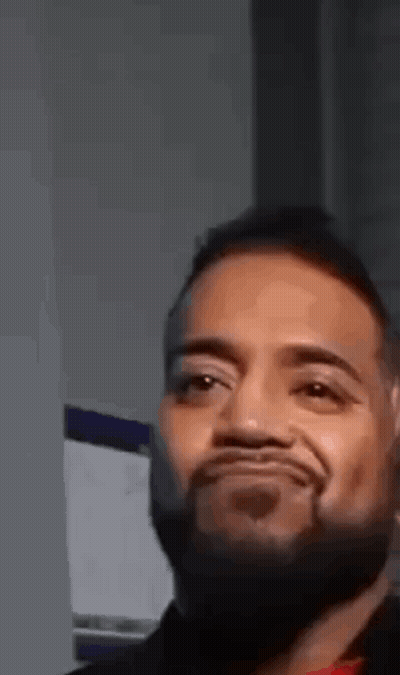 Bearded Man Making Funny Face At Camera GIF