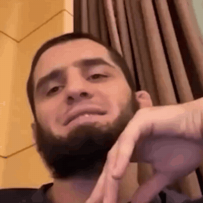 Bearded Man Making Funny Face By Window GIF