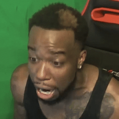 Bearded Man Making Funny Face In Chair GIF