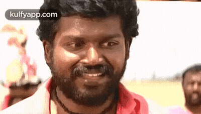 Bearded Man Making Funny Face In Front Of Crowd GIF