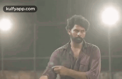 Bearded Man Making Funny Face in Front of Light