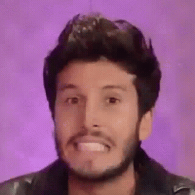 Bearded Man Making Funny Face In Leather Jacket GIF