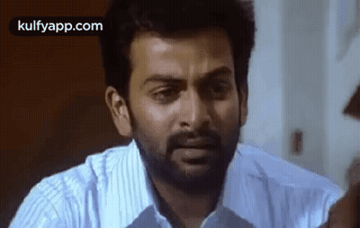 Bearded Man Making Funny Face In White Shirt GIF