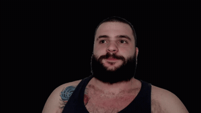 Bearded Man Making Funny Face Pointing Up GIF