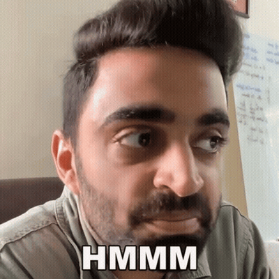 Bearded Man Making Funny Face Saying Hmm GIF