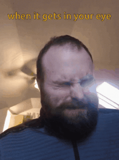 Bearded Man Making Funny Face Saying When It Gets In Your Eye GIF