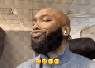 Bearded Man Making Funny Face With Tongue Out GIF
