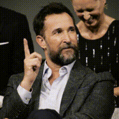 Bearded Man Making Point To Woman GIF