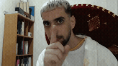 Bearded Man Making Shhh Gesture GIF