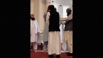 Bearded Man Next To Group Of Men GIF