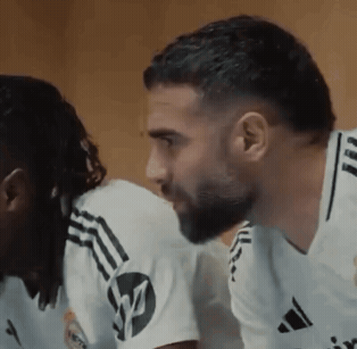 Bearded Man Next To Man In White Adidas Shirt GIF