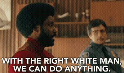 Bearded Man Next To Police Officer Saying With The Right White Man We Can Do Anything GIF