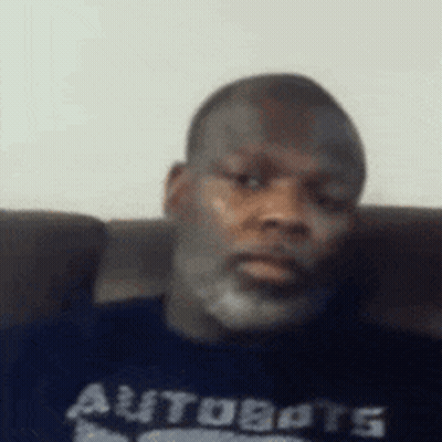 Bearded Man On Couch In Autobots T-Shirt GIF