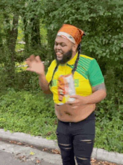 Bearded Man On Road Holding Soda Can GIF