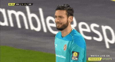Bearded Man On Soccer Field In Front Of Amble Esp Banner GIF