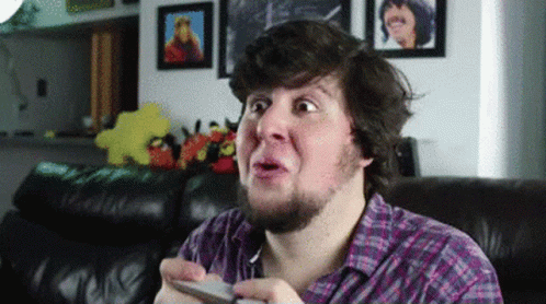 Bearded Man Playing Video Game Making A Face GIF