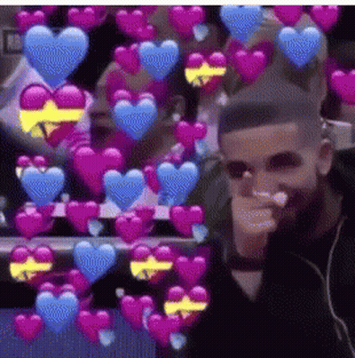 Bearded Man Pointing At Camera With Hearts GIF