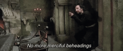 Bearded Man Pointing In Dark Room GIF