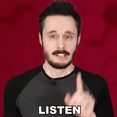 Bearded Man Pointing Up Wearing Listen Shirt GIF