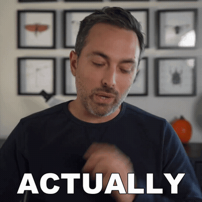 Bearded Man Saying Actually At Picture Wall GIF
