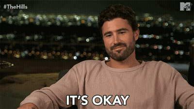 Bearded Man Saying It's Okay In City GIF