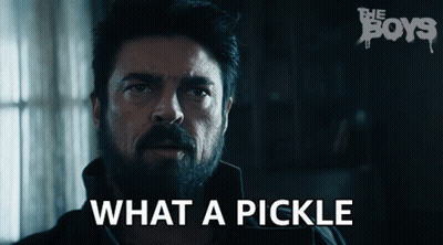 Bearded Man Saying What A Pickle In Dark Room GIF