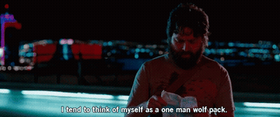 Bearded Man Says I Tend To Think Of Myself As A One Man Wolf Pack Holding Paper GIF
