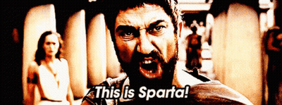 Bearded Man Says This Is Sparta In Front Of Woman GIF
