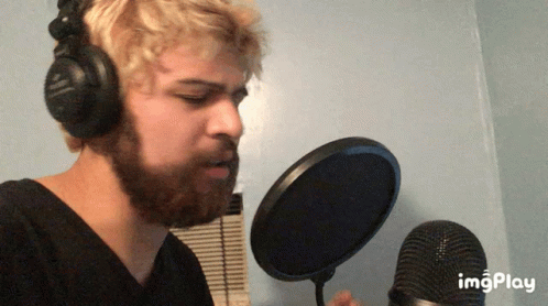 Bearded Man Singing Into Microphone GIF