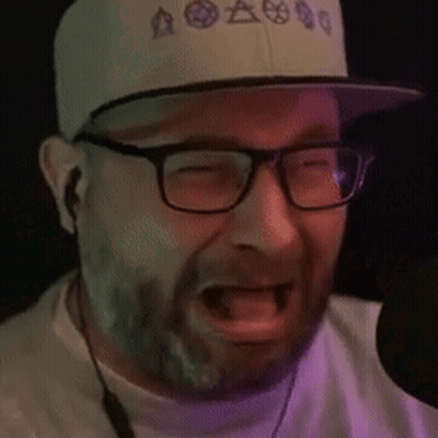 Bearded Man Singing Into Microphone GIF