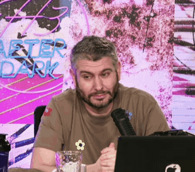 Bearded Man Sitting At Laptop After Dark Sign GIF